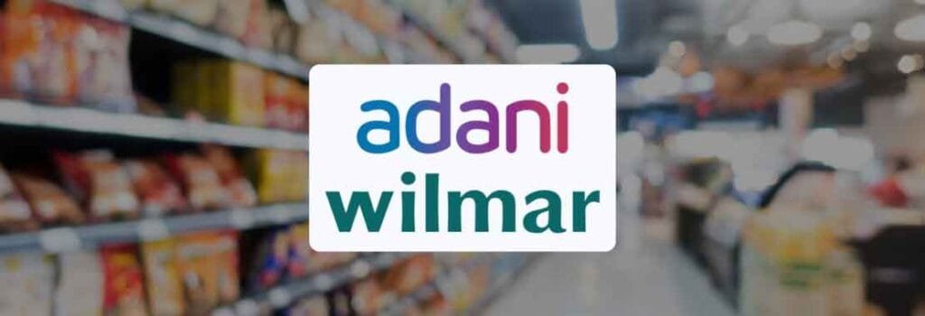 "A stock chart showing the impact of Adani Wilmar's 9% share price crash after the announcement of a 20% stake sale via Offer for Sale (OFS) by its promoter."